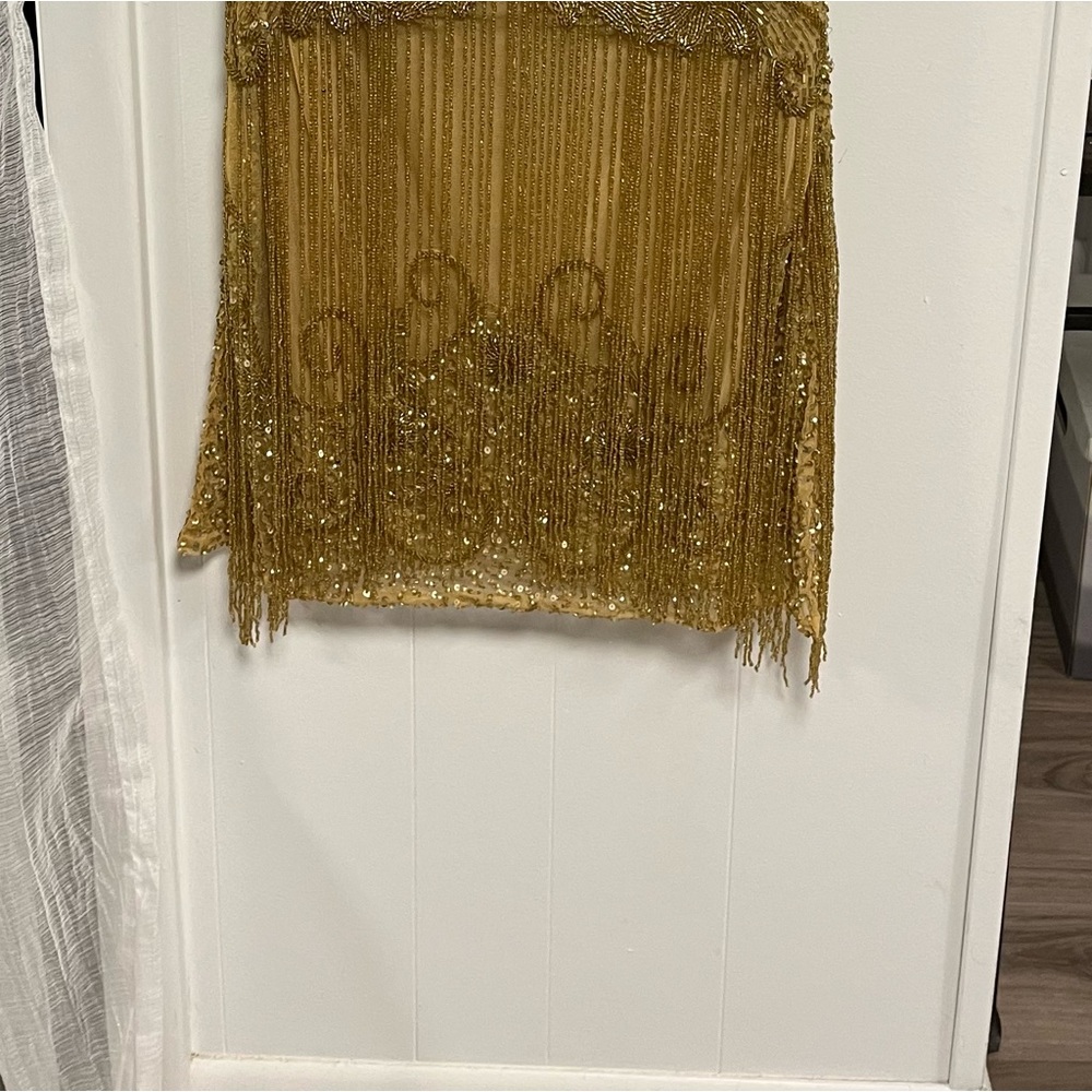 Gorgeous dress. Made w/ some stretch for perfect fit. Tags on. Never worn.